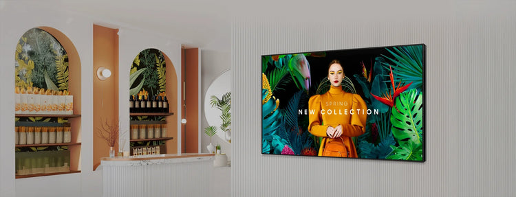 Commercial display mounted in a retail store showing a fashion campaign