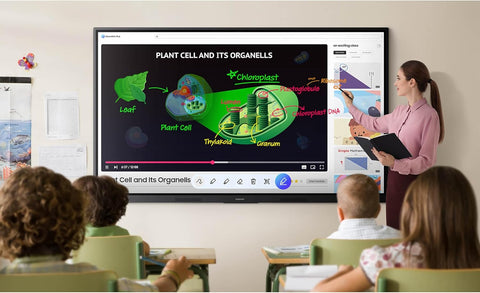 Teacher using a Samsung 75 inch WAF interactive whiteboard in a classroom